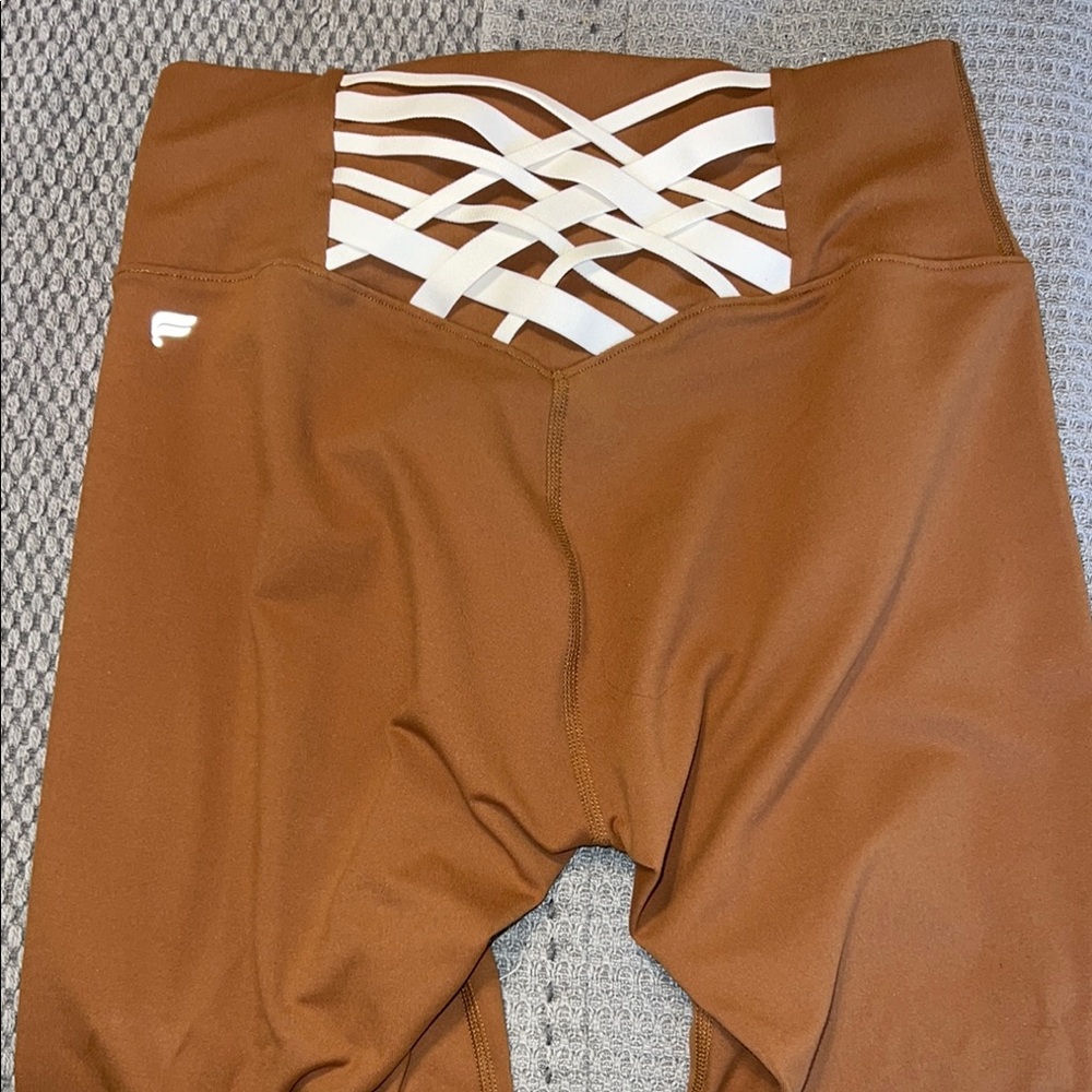 Fabletics Powerhold Brown and White Lace-Up Leggings with Criss-Cross Detail